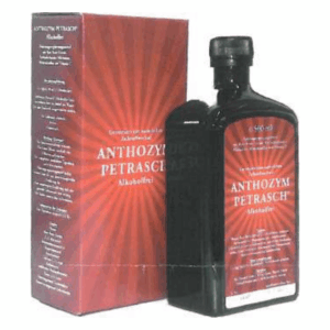 Schwarze Flasche mit rotem Etikett, umgeben von einer roten Verpackung, die "ANCHOZYM PETRASCH alkoholfrei" zeigt.