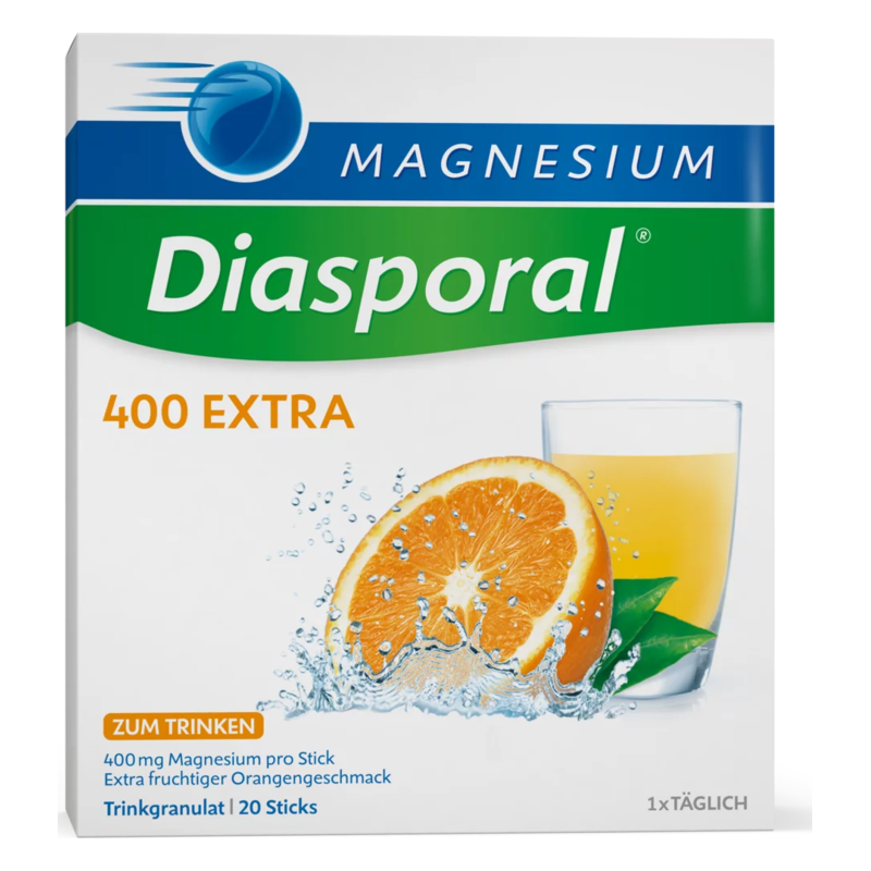 Verpackung von Diasporal Magnesium 400 Extra, mit orangefarbener Flüssigkeit und Orangenscheibe, geschmückt mit Wassertröpfchen.