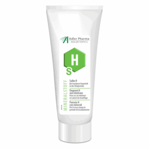 Tube mit Mineralstoffsalbe H zur Linderung bei trockener Raumluft, weiß mit grüner Beschriftung.