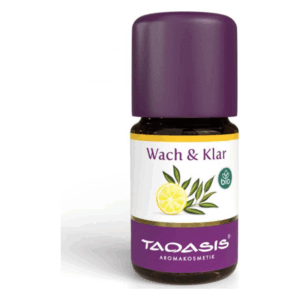 Braunglasflasche mit lila Kappe, etikettiert mit "Wach & Klar" und einer Zitronenabbildung.