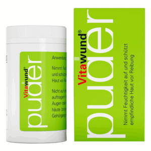 Weißer Behälter mit grünem Etikett und der Aufschrift 'Vitawund Puder', schützt die Haut vor Reibung.
