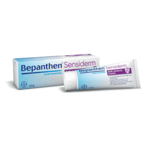 Tube und Verpackung der Bepanthen Sensiderm Anti-Juckreiz Creme, 20g, in blauer und weißer Farbkombination, ohne Kortison.