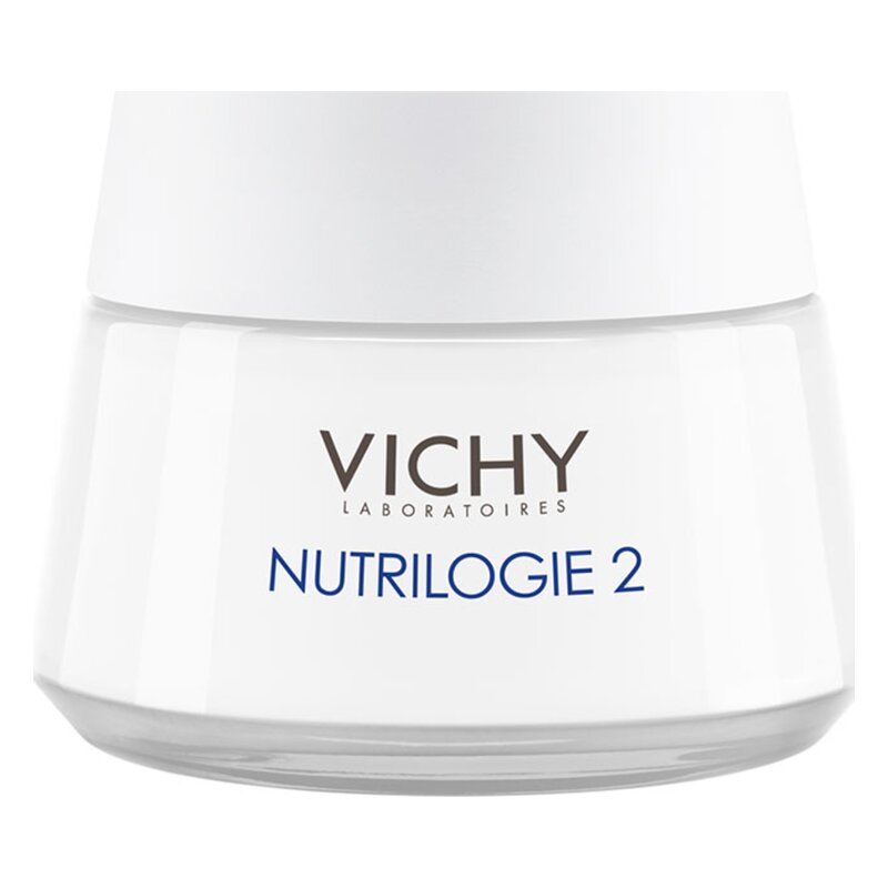 Eine weiße Cremedose mit einem klaren Deckel, beschriftet mit "VICHY NUTRILOGIE 2".