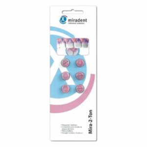 Verpackung mit sechs pinken dentale Indikator-Tabletten auf hellem Hintergrund mit Logo und detaillierter Beschreibung.