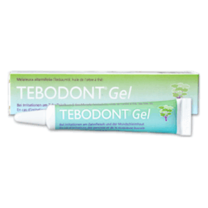 Tebodont Gel in einer grünen Tube mit einer weißen Verschlusskappe, verpackt in einem farblich passenden Karton.