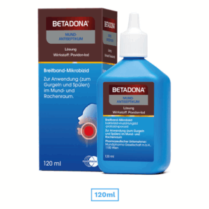 BETADONA Mundspülung in blauer Flasche mit Informationen zur Anwendung und Wirkstoff auf der Verpackung.