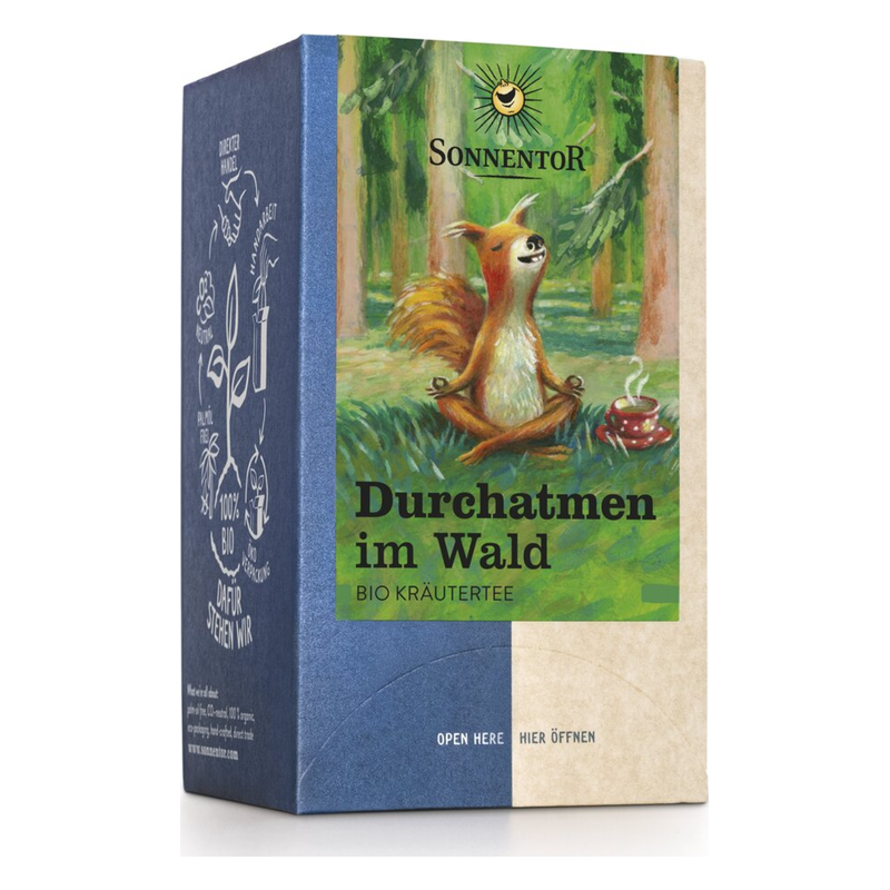 Verpackung von "Durchatmen im Wald" Bio-Kräutertee, mit einer relaxenden Eichhörnchen-Grafik im Wald.