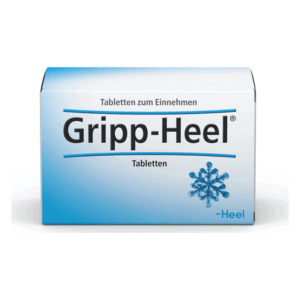 Weißes Verpackungsdesign für Gripp-Heel Tabletten mit blauen Akzenten und Schneeflockenmotiv.