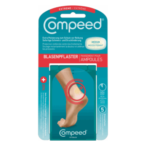 Verpackung eines Compeed Blasenpflasters in mittlerer Größe mit Bild eines Fußes und Beschreibung des Produkts.