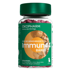 Packung mit Nahrungsergänzungsmitteln zur Unterstützung des Immunsystems, mit einem grünen Deckel und rosa Kapseln.