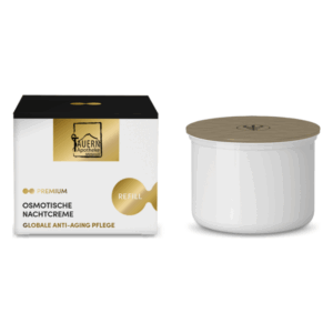 Verpackung einer osmotischen Nachtcreme in einem eleganten weißen Behälter mit Holzdeckel und schwarzer Schachtel.
