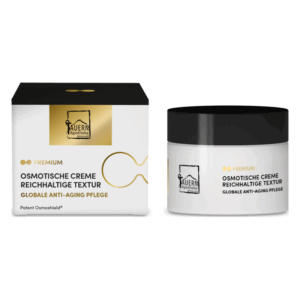Eine Osmotische Anti-Aging-Creme in einem weißen Tiegel mit schwarzem Deckel und passender Verpackung.