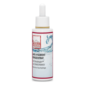 Flasche mit Anti-Pigmentkonzentrat von Tauern Apotheke, ausgestattet mit Pipette und blauem Wassertropfen-Design.