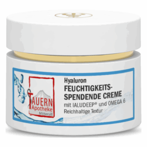 Hyaluron Feuchtigkeitscreme in einem weißen Tiegel mit goldener Blende und blauem Etikett.
