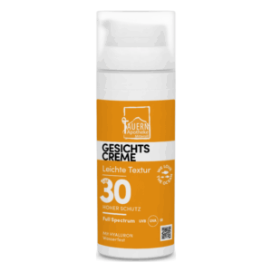 Gesichtscreme mit LSF 30, wasserfest, leichte Textur, in einem weißen Flakon mit orangefarbenem Etikett.