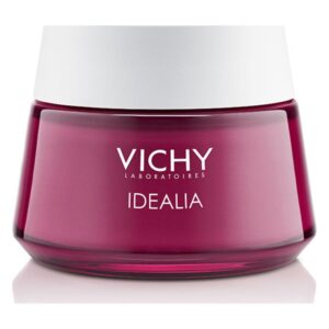 Runde Flasche mit pinkfarbener Creme und weißem Deckel, beschriftet mit "VICHY IDEALIA".