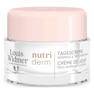 Glasjar mit rosa Deckel, enthält Tagescreme für normale und trockene Haut von Louis Widmer.