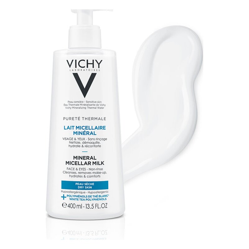 Flasche mit Vichy Mineral Mikellar-Milch für Gesicht und Augen, mit Pumpspender und ausgelaufener Flüssigkeit.