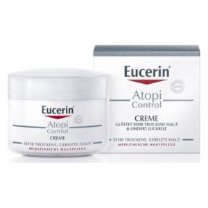 Eucerin Atopi Control Creme in einem weißen Tiegel mit einer Verpackung, die medizinische Hautpflege anzeigt.
