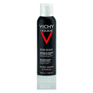 Schwarze Dose mit Rasierschaum für empfindliche Haut, Markierung "Vichy Homme" und Anti-Irritation Hinweis.