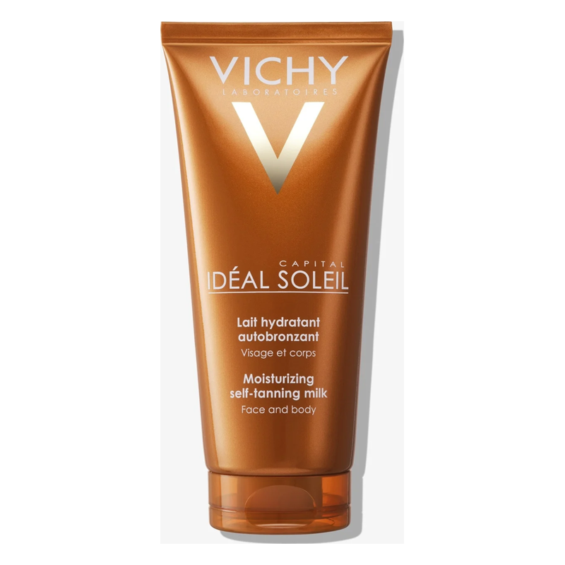 Eine braune Tube mit selbstbräunender Lotion für Gesicht und Körper von Vichy, mit silbernem Logo.