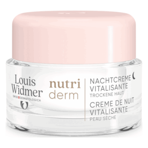Glasbehälter mit rosa Deckel, enthält Nachtcreme für trockene Haut von Louis Widmer, beschriftet mit "nutri derm".
