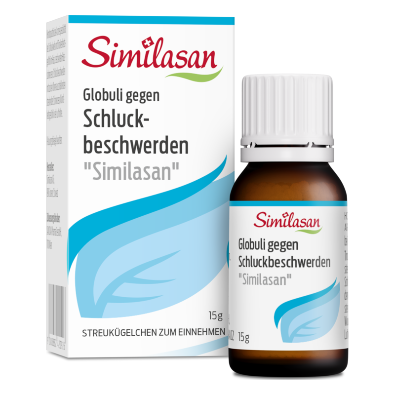 Eine Flasche mit Globuli gegen Schluckbeschwerden "Similasan" neben der Verpackung, auf der die Anwendungshinweise stehen.