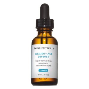 Braunes Glasfläschchen mit einer Pipette, etikettiert mit 'Blemish + Age Defense' von SkinCeuticals.