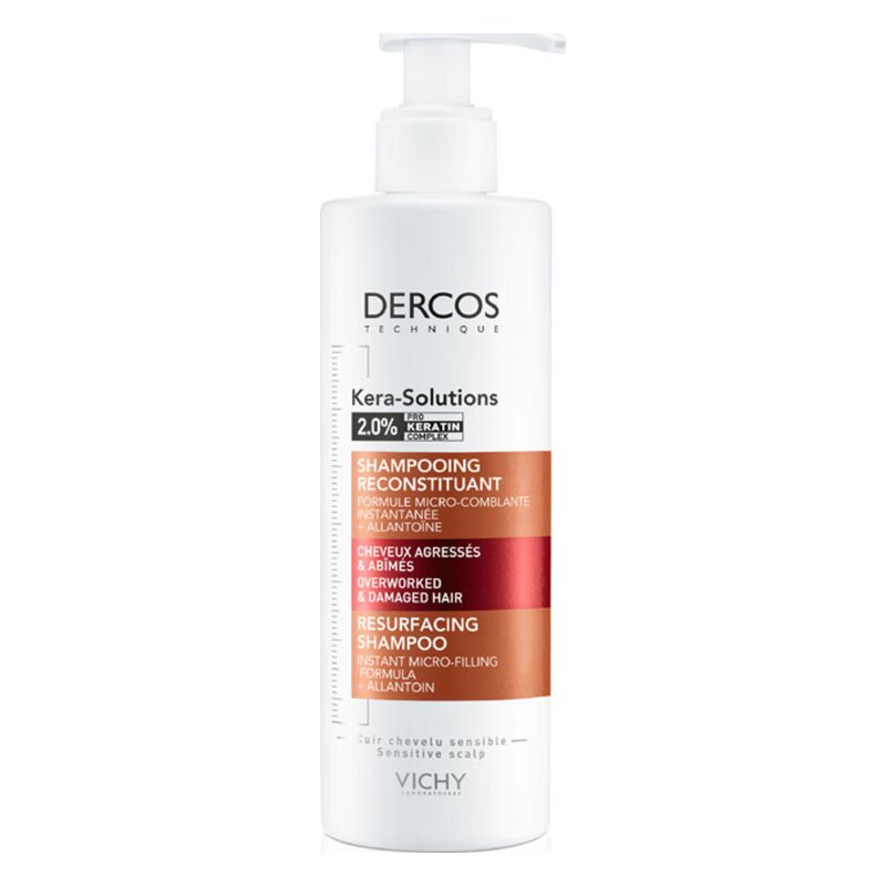 Weißer Pumpflasche mit Shampoo, beschriftet für überarbeitetes und beschädigtes Haar, Vichy Dercos Kera-Solutions.