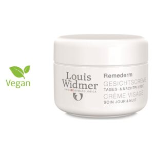 Weiße Gesichtscreme von Louis Widmer in einem runden Tiegel, gekennzeichnet als vegan.