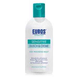 Flasche EUBOS Sensitive Dusch & Creme für trockene Haut mit grünem Deckel und Pflegehinweisen auf dem Etikett.