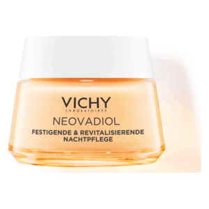 Vichy Neovadiol Nachtpflege in einem runden, gläsernen Tiegel mit einem weißen Deckel und orangefarbenem Inhalt.