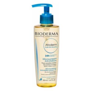 Transparente, flüssige Duscheölflasche von Bioderma mit blauer Pumpe und Etikett in mehreren Sprachen.