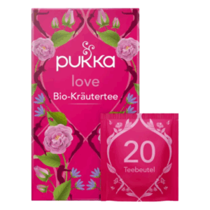 Verpackung von Pukka's Love Bio-Kräutertee in lebhaftem Pink mit floralen Motiven und sichtbarem Teebeutel.