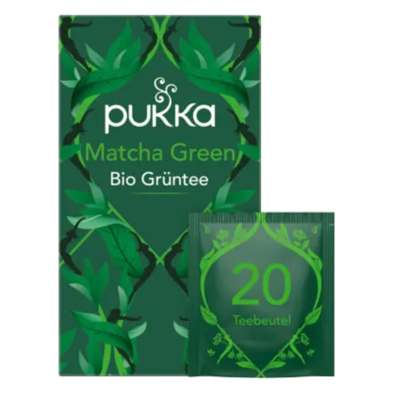 Verpackung von Pukka Matcha Green Bio Grüntee mit grafikverzierter Box und einem Teebeutel in der Ecke.