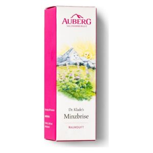 Rosa Verpackung mit dem Schriftzug 'Dr. Klade's Minzbrise' und einer Illustration von Bergen und Sonne.