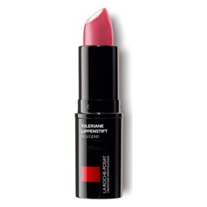 Ein schmaler, schwarzer Lippenstift mit einer rosafarbenen Spitze, etikettiert mit "Toleriane Pflege" von La Roche-Posay.