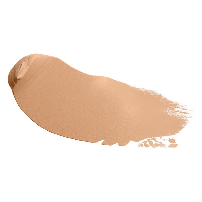 Cremefarbene Foundation in einer sanften Textur, auf einer weißen Oberfläche verteilt.