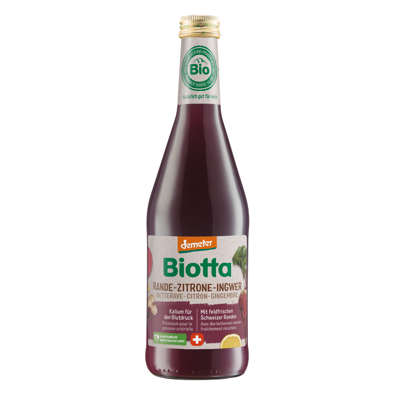 Flasche Biotta Rande-Zitrone-Ingwer mit einem klaren Etikett und Deklaration von Bio-Zutaten.