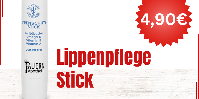 Lippenpflege-Stick in weißer Verpackung, enthält Sheabutter, Vitamine und UVB-Filter.