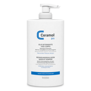 Weiße Flasche mit Pumpspender, enthält milde Reinigungsemulsion für Gesicht und Körper, verpackt in dermatologisch getesteter Formel.