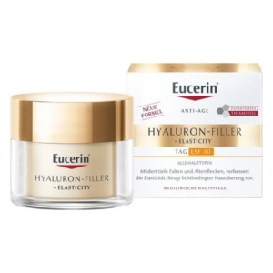 Eucerin Hyaluron-Filler + Elasticity Tagescreme in glasartigem Behälter mit goldfarbenem Deckel, umgeben von der Verpackung.