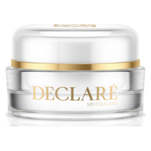 Glascremebehälter mit goldener und transparenter Verpackung, beschriftet mit 'DECLARÉ SWITZERLAND'.