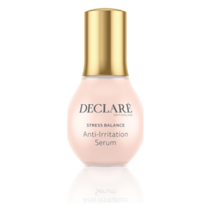 Flasche mit Anti-Irritationsserum von DECLARÉ, goldener Verschluss, rosa transparente Verpackung.