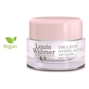 Die Verpackung einer veganen Hydro-Active Emulsion von Louis Widmer mit rosa Deckel und klarer Glasdose.